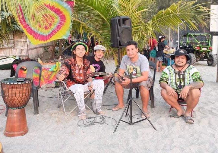 Julius Molina(on the left side holding microphone) is the KA&CO's Business Development Agency Partner and Conrad Cataag(wearing a gray shirt on the middle), with a couple of members of the Acoustic Reggae Band.